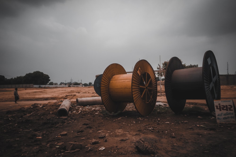 two brown and black wooden barrels