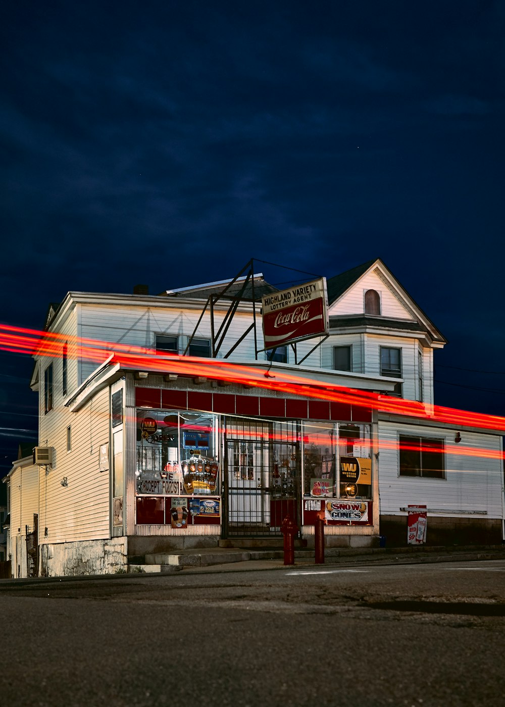 time lapse photo of storefront during nighttime