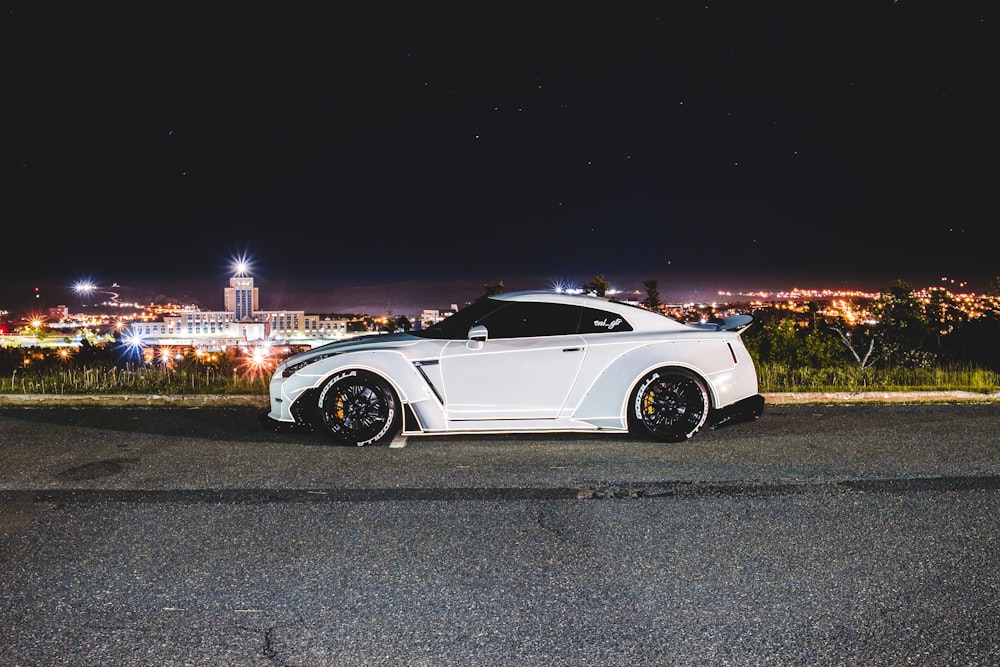 white sports car on road