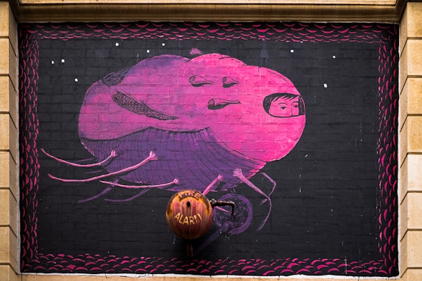 purple and black painting on wall