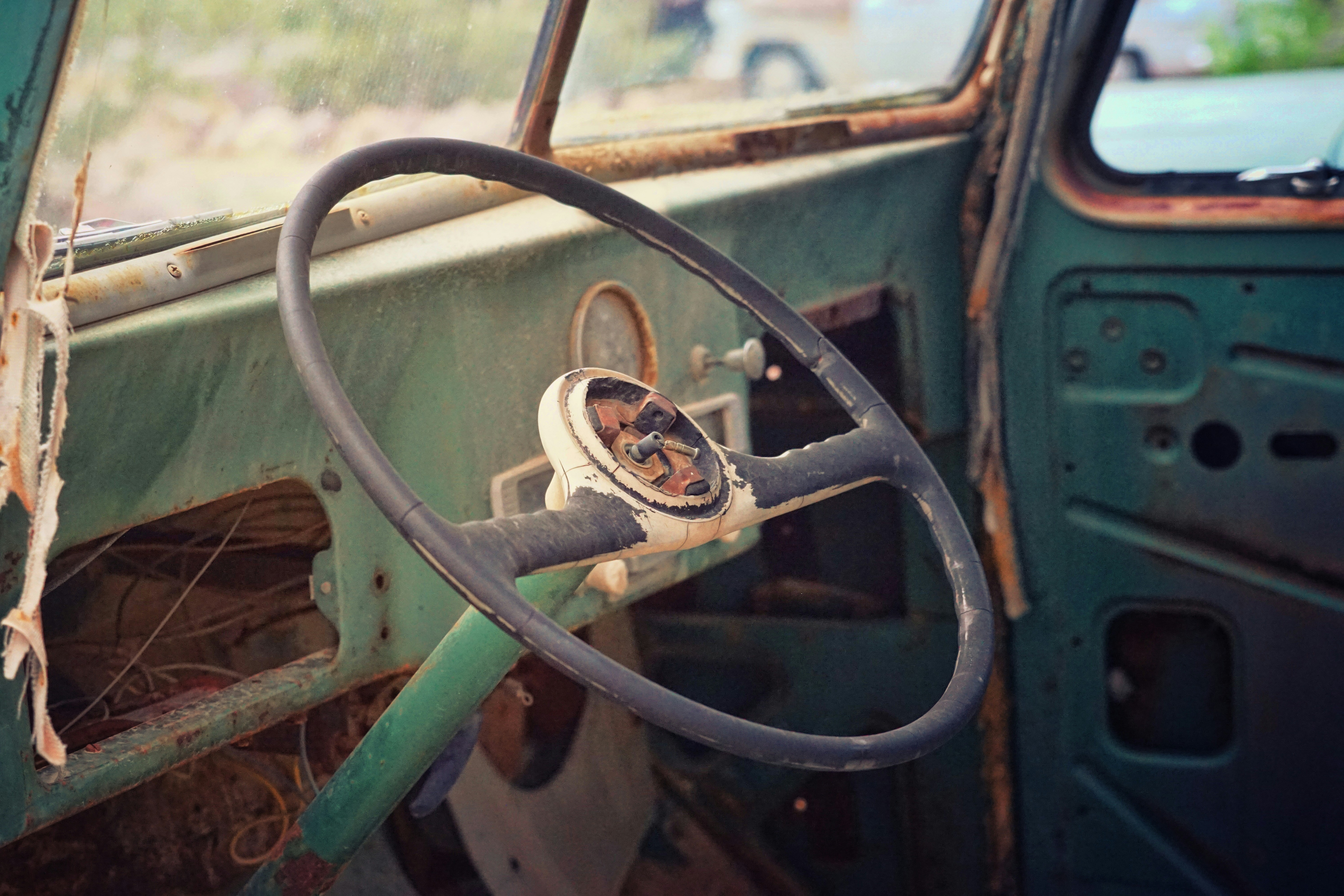 steering wheel inside abandoned car
