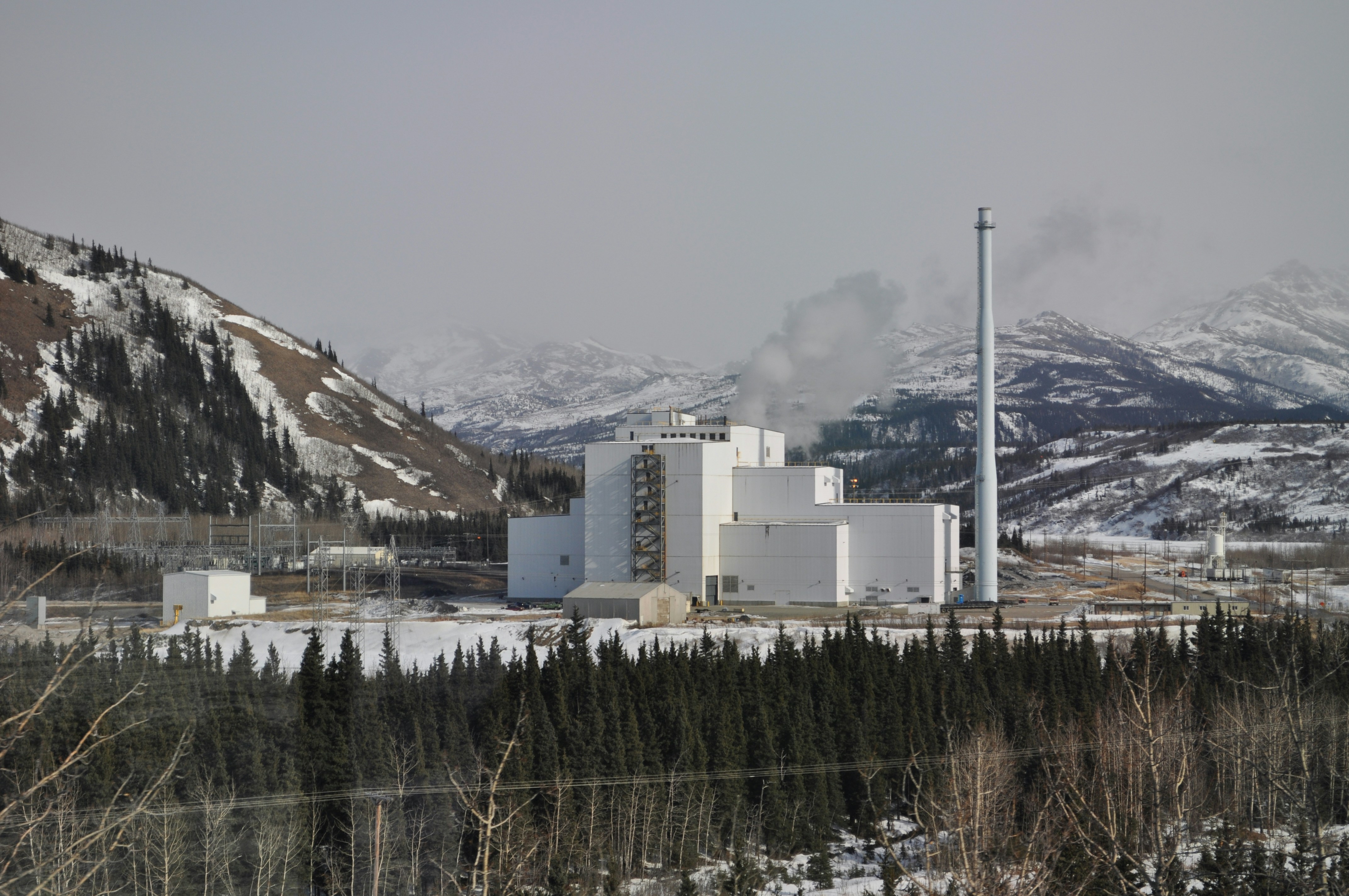 The Healy coal-fired power plant outside of Fairbanks seen from the Alaska Railroad Aurora Winter Train. This plant has been intermittently operational since its construction in 1997.