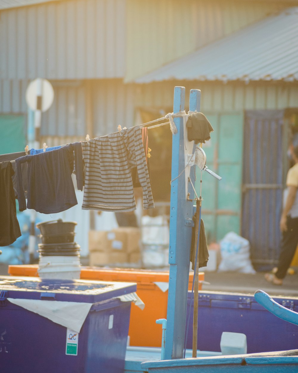 assorted-color tops hanged on wires