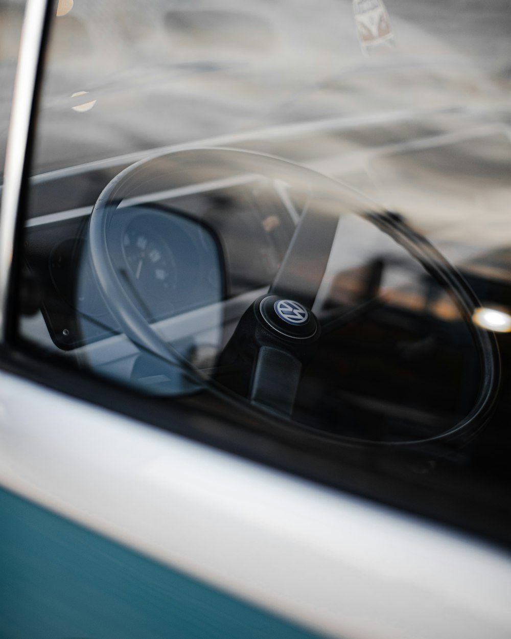 black Volkswagen steering wheel