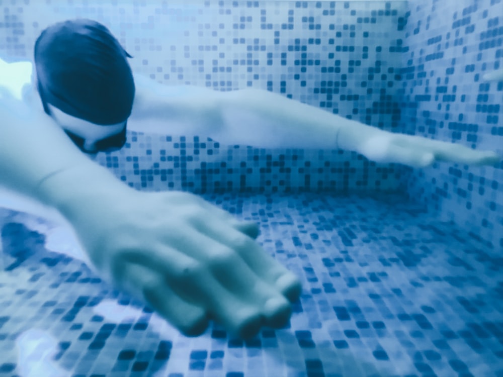 man swimming underwater