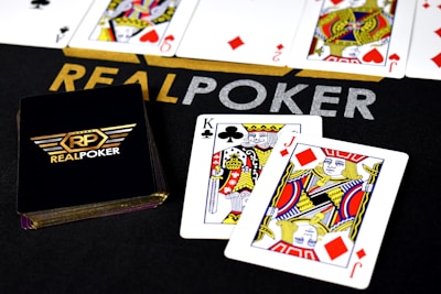 A vibrant graphic showing a deck of cards and poker chips symbolizing online rummy games.