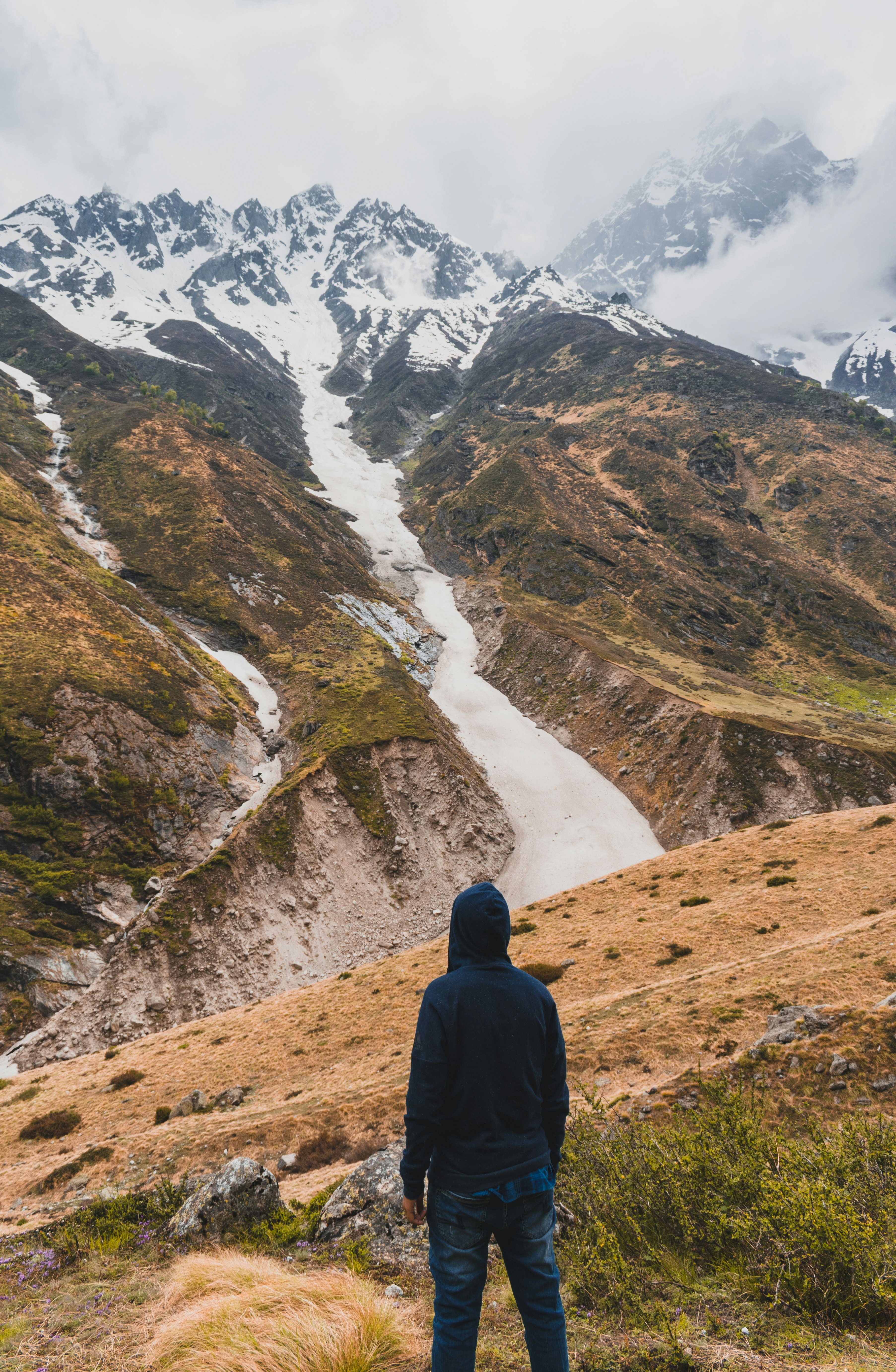 man standing on hill