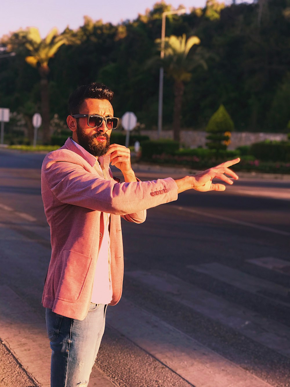 man standing near pedestrian lane