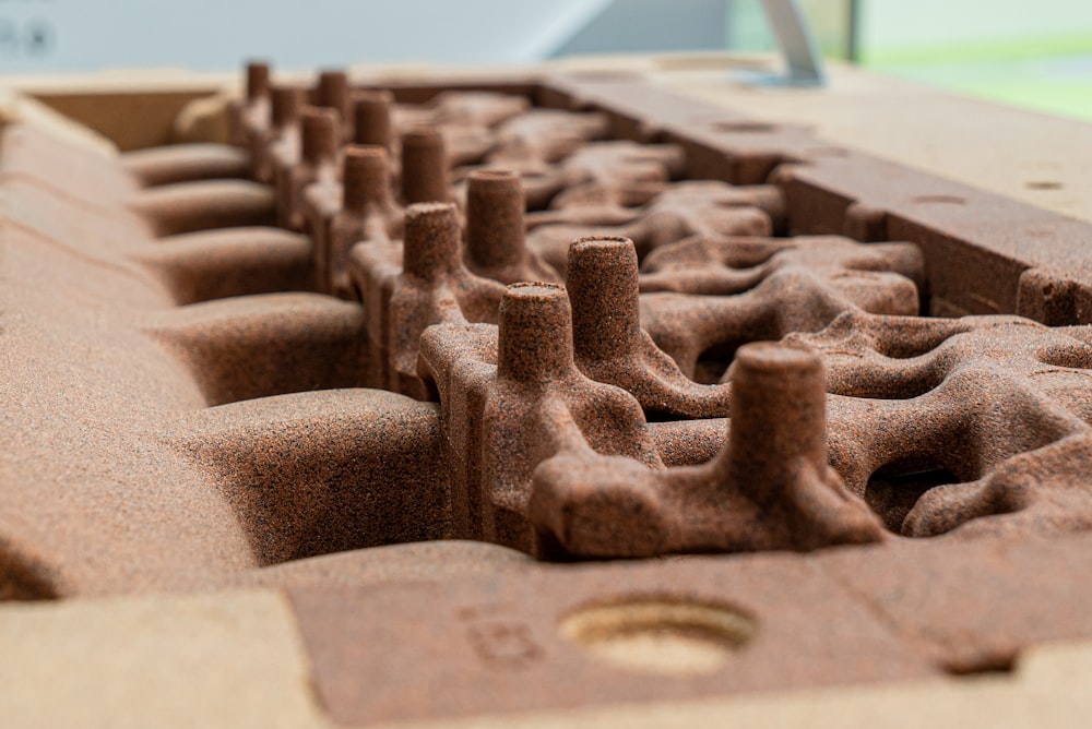 a close up of a brick with holes in it