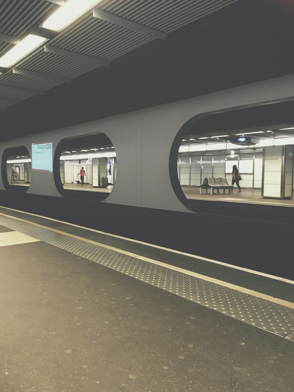 white and black train platform