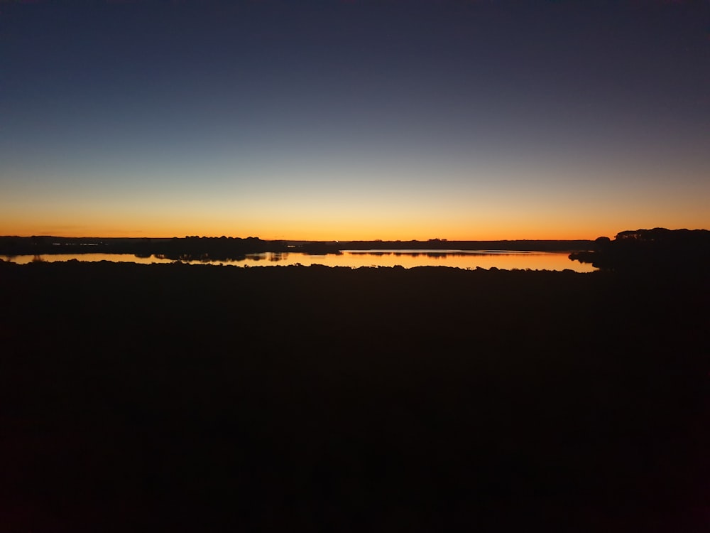 orange sky over sea at sunset