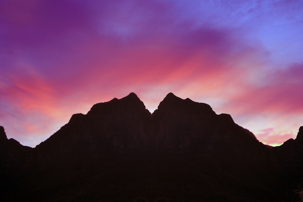 silhouette of mountain during golden hour