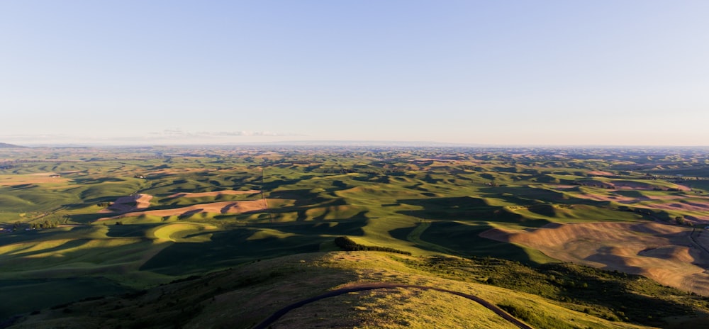 birds eye photography of green mountain