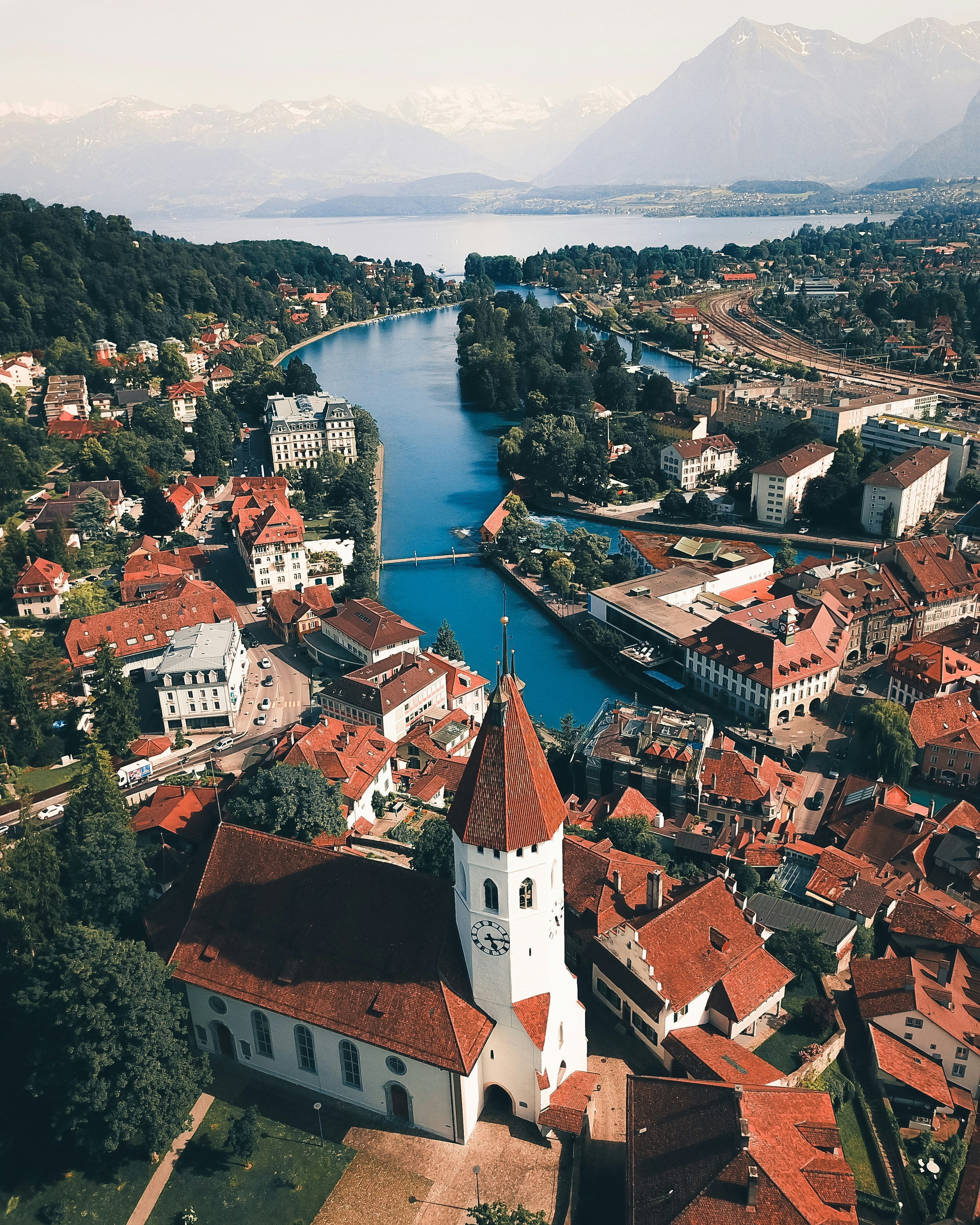 brown concrete buildings near river