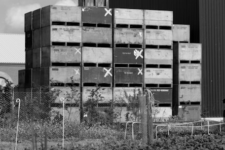 Photo of packed crates ready for shipment at a busy Pakistani export warehouse.