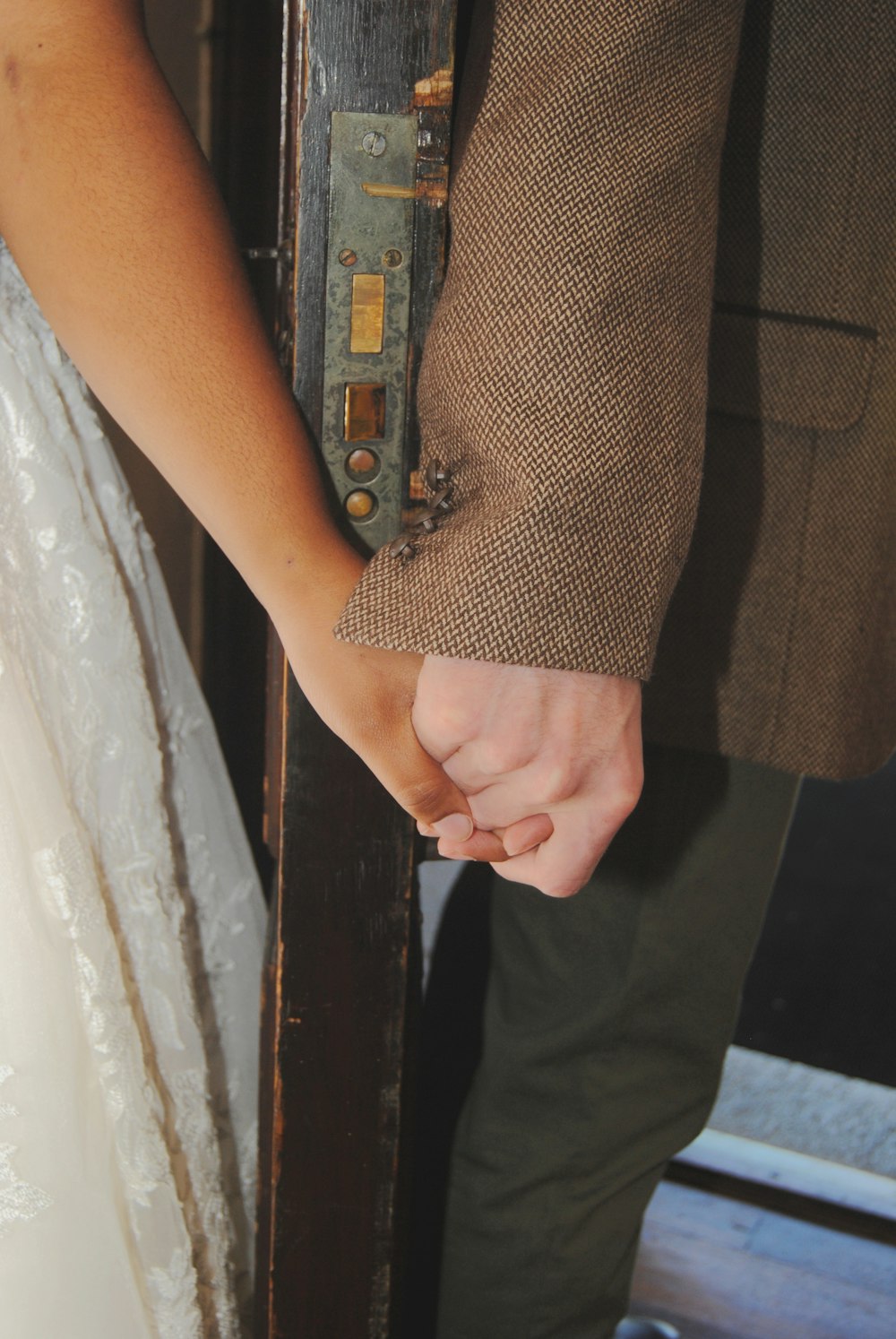 two person holding hands