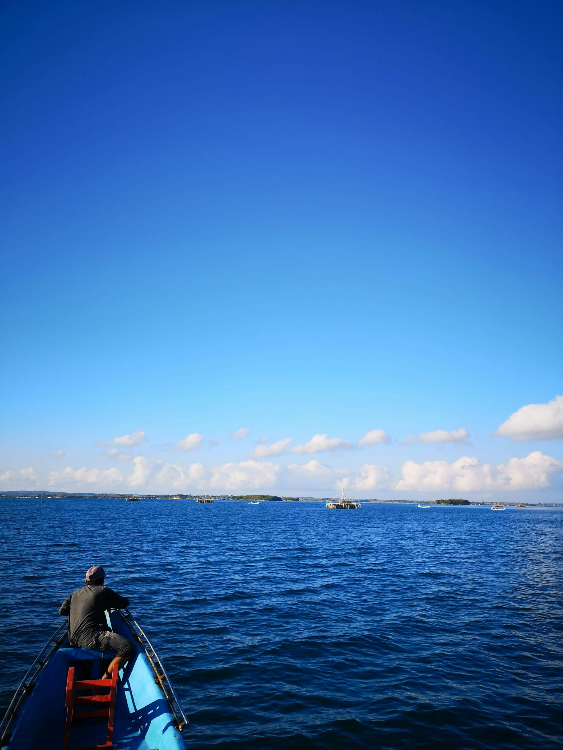 man on boat sailing on ocean