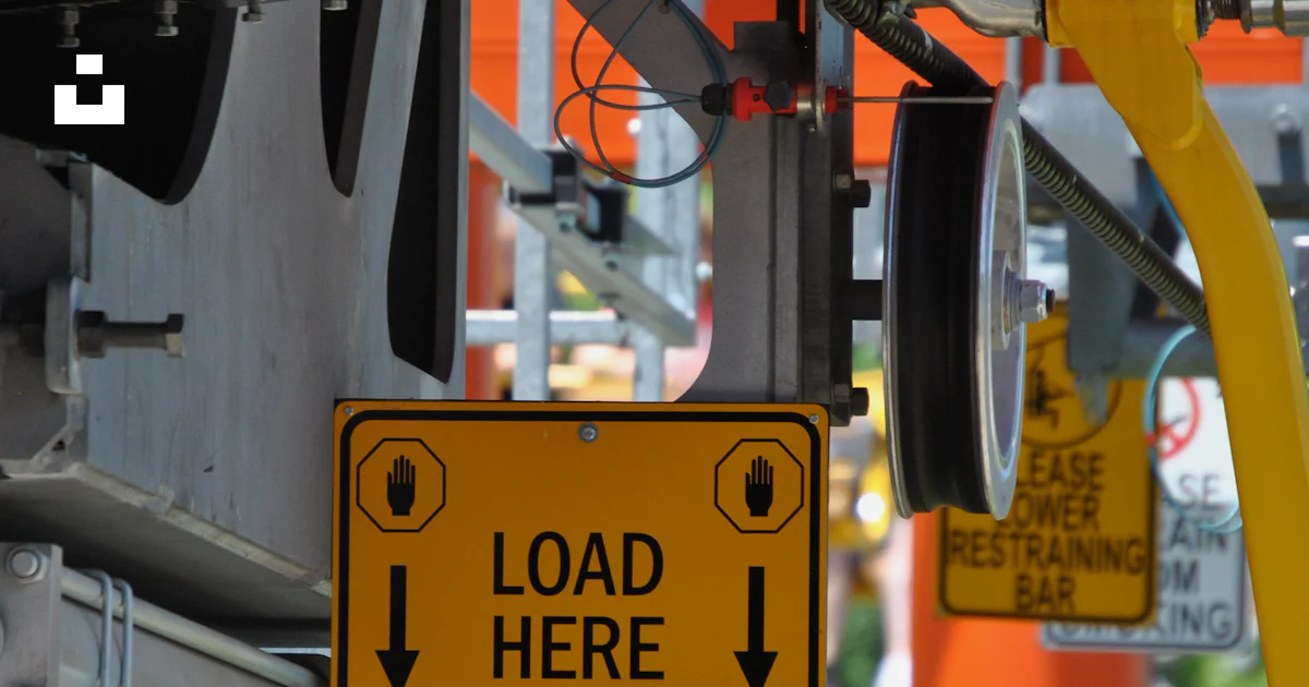 Yellow Loading Sign Yellow load here signage photo – Free Sign Image on Unsplash