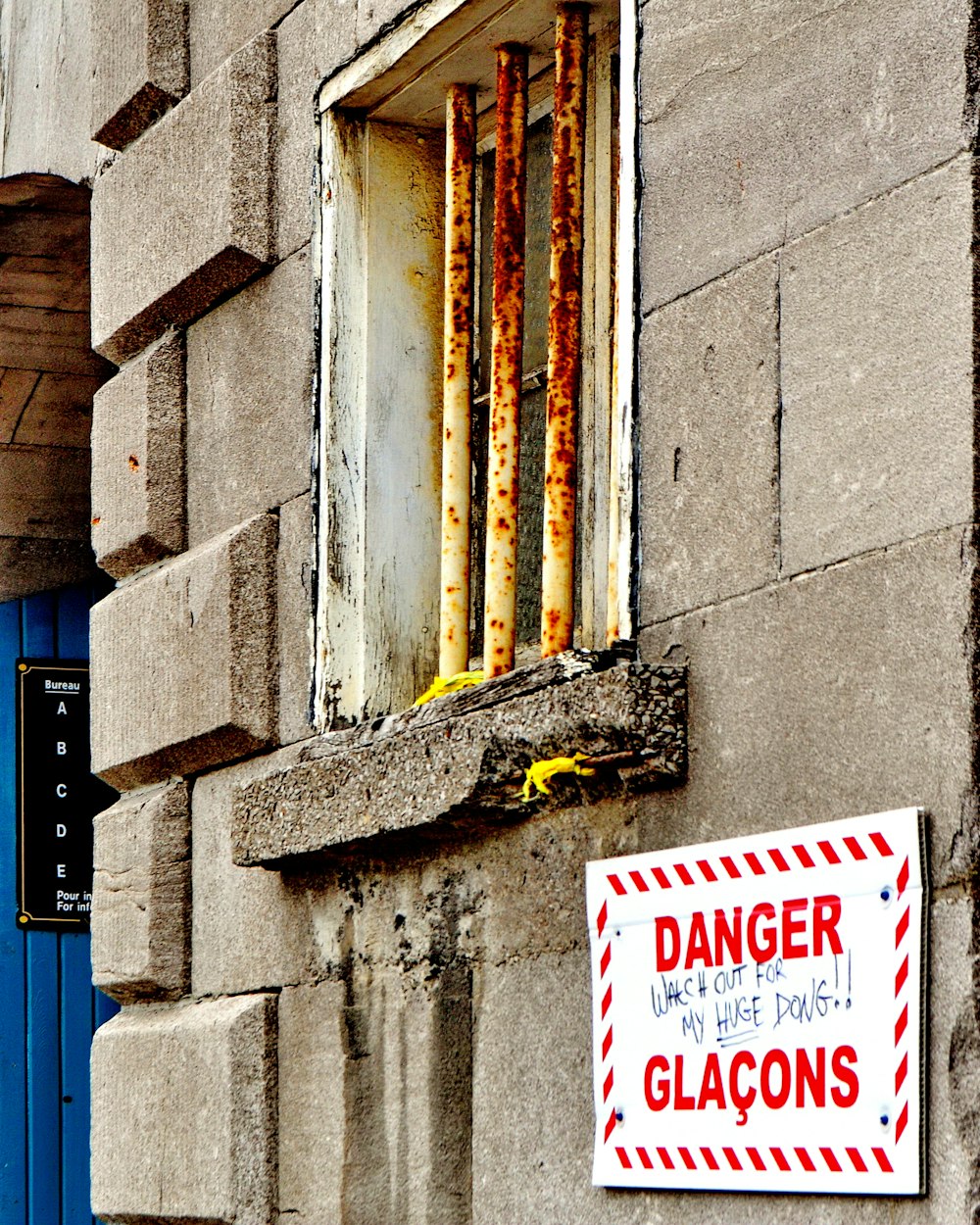 Danger signage on wall