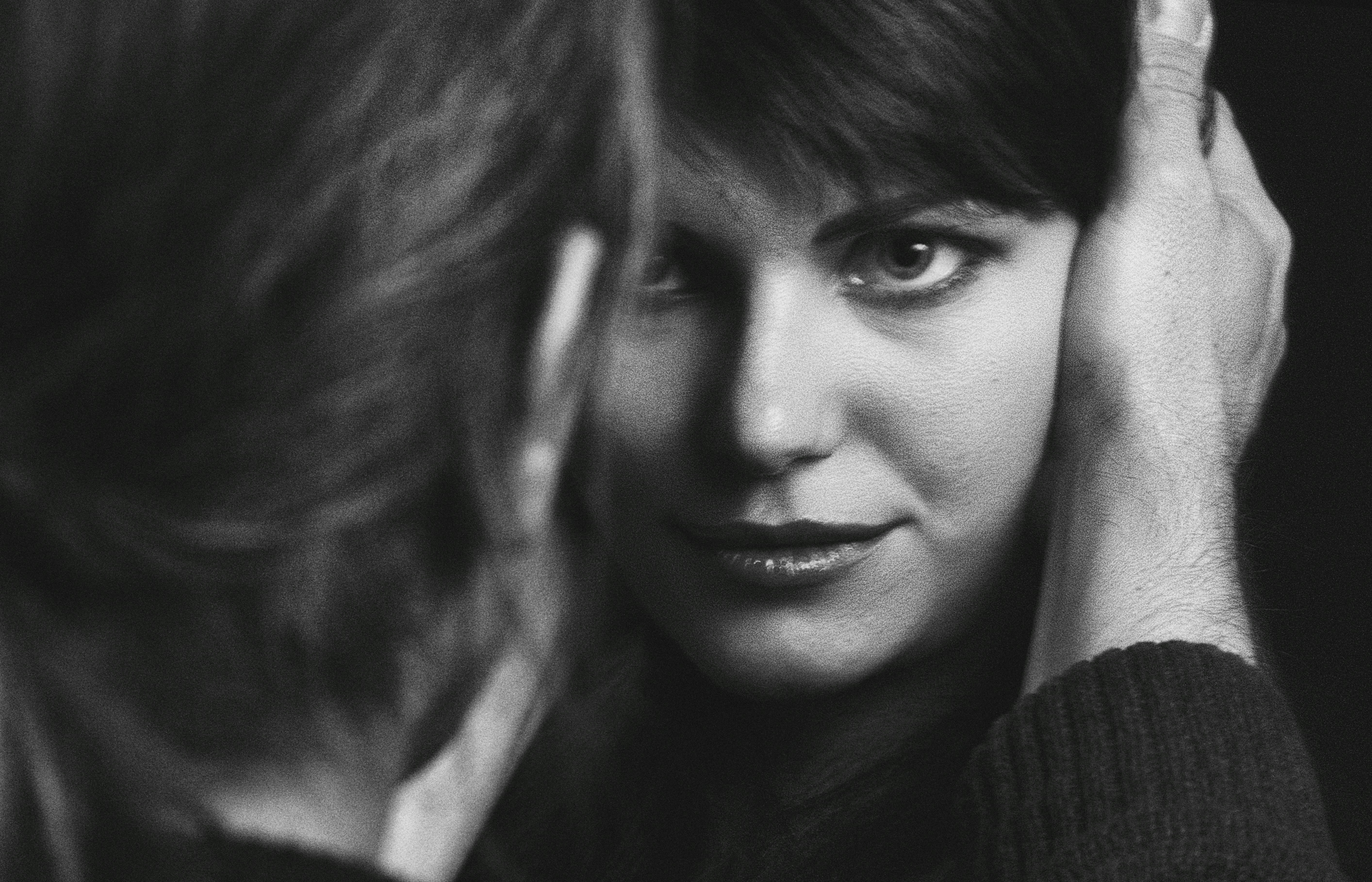 A tasteful, intimate photo showcasing expressive eyes and subtle emotion.