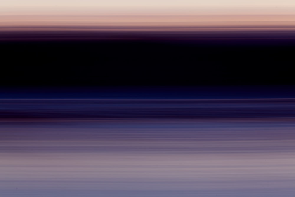 a blurry photo of a body of water