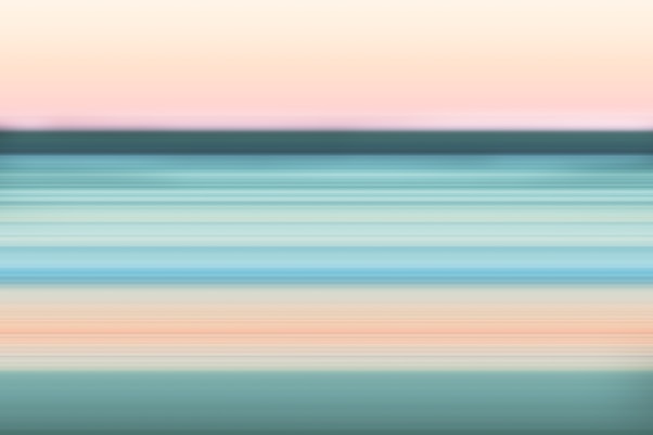 a blurry photo of the ocean and sky