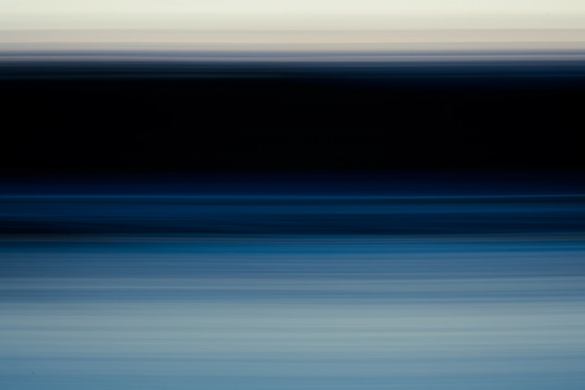 a blurry photo of a body of water