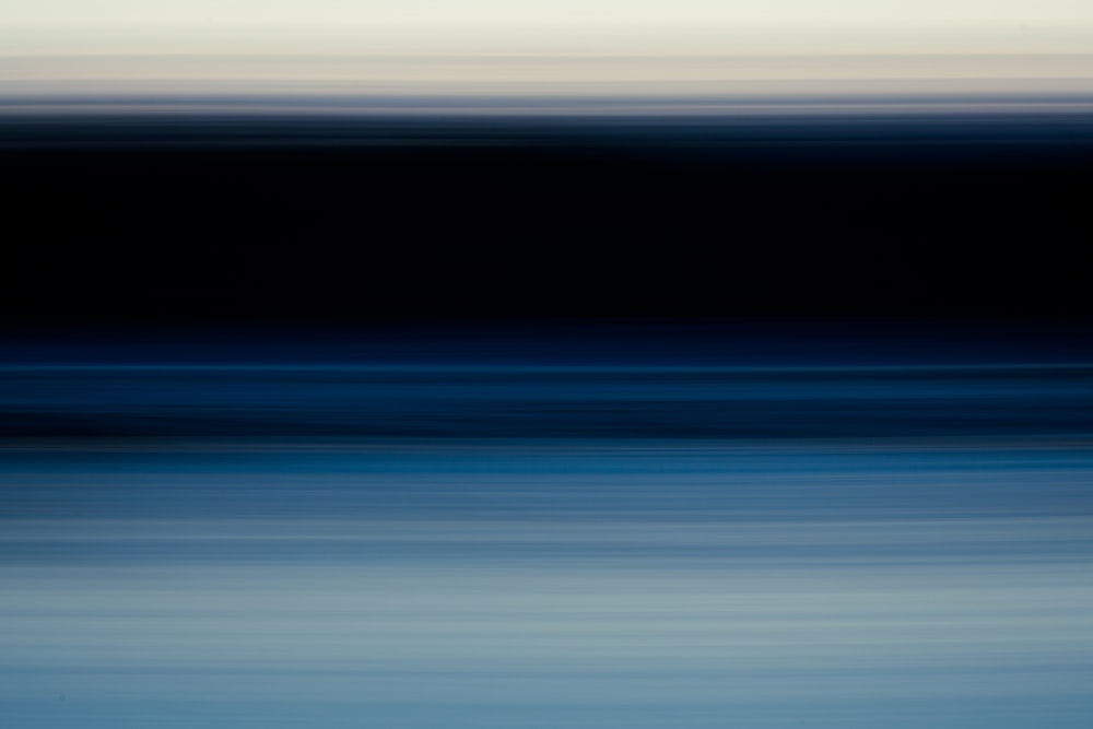 a blurry photo of a body of water
