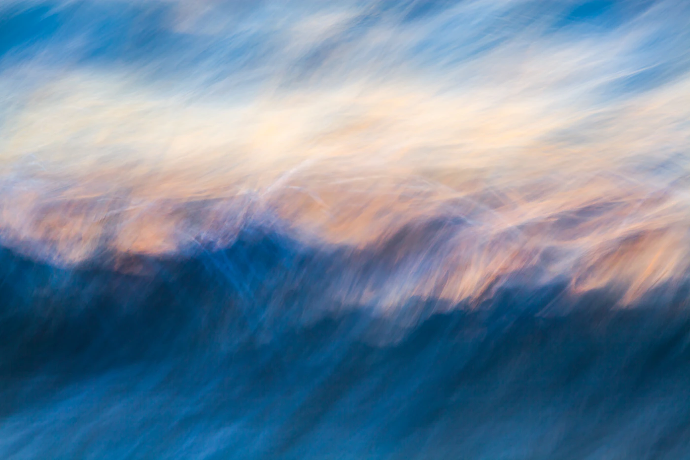 A Pacific wave captured with slow shutter speed at Pacific Rim National Park beach near Tofino