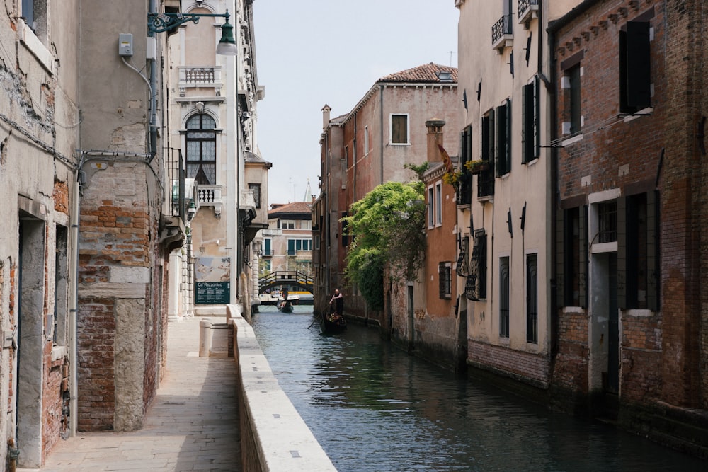 body of water near buildings during daytime