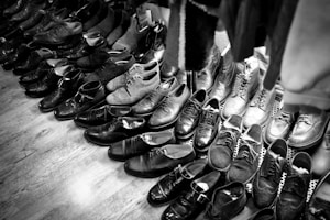 A selection of adult shoes including casual and formal options
