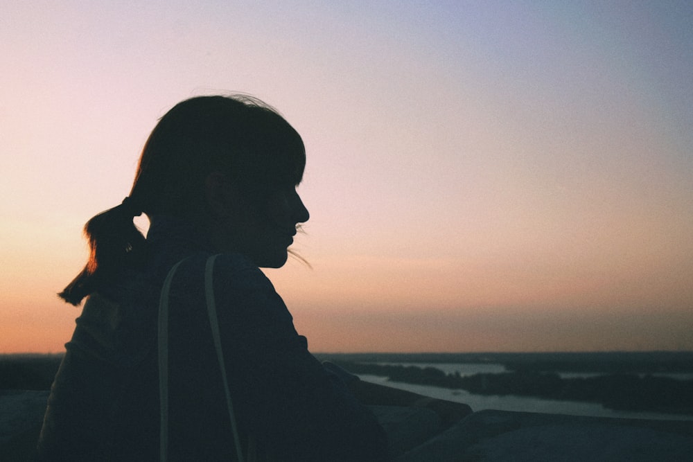 woman looking at beach