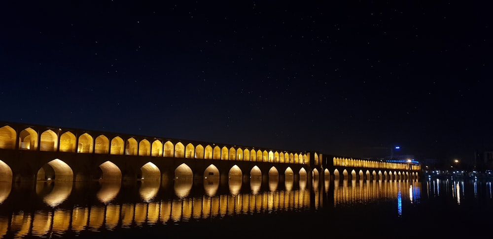 a large stone bridge over a body of water