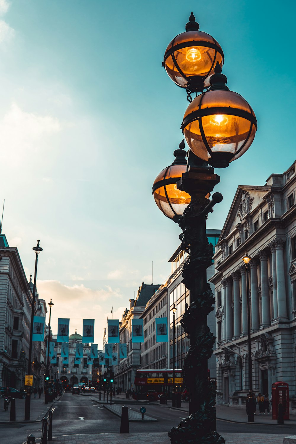 lighted post lamp during daytime