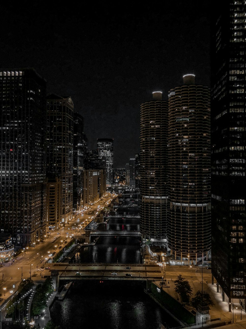 gray concrete bridge near buildings