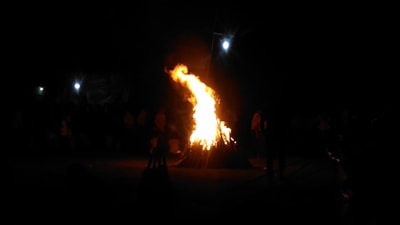 Community members gathered around a bonfire sharing stories in the evening.