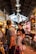 A group of tourists enjoying a guided tour in a vibrant Polish market.