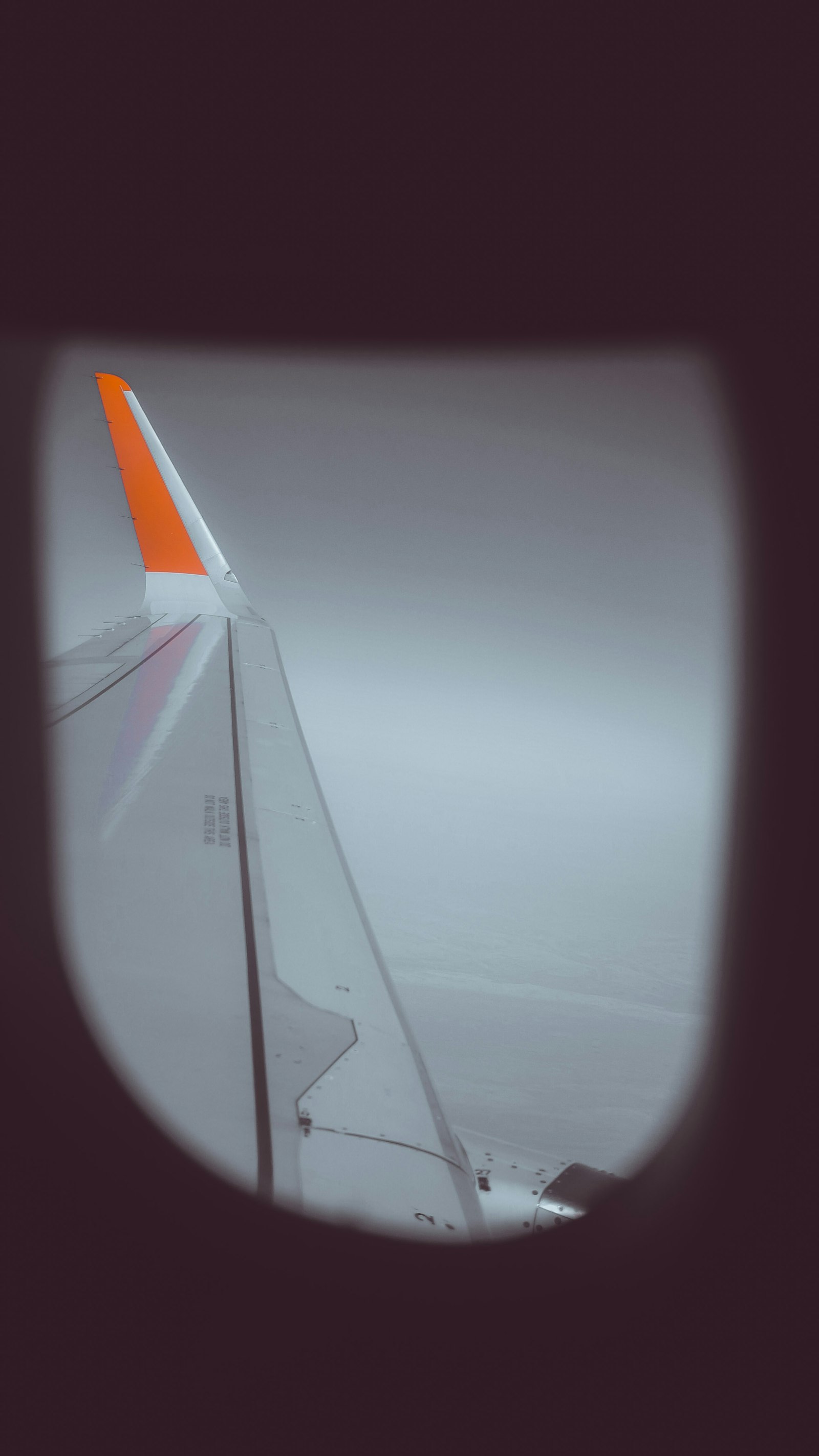 Panasonic Lumix G 20mm F1.7 ASPH sample photo. Gray airplane wing photography