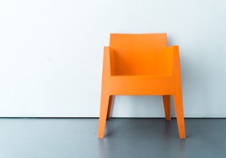 orange plastic armchair