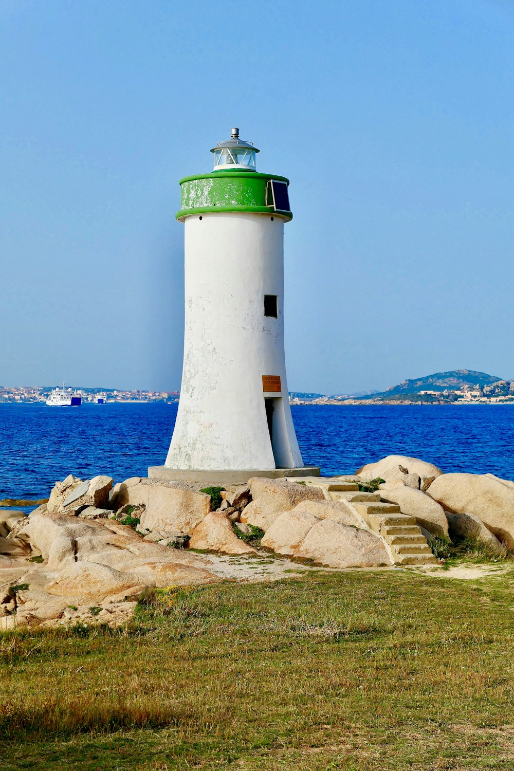 lighthouse near body of water