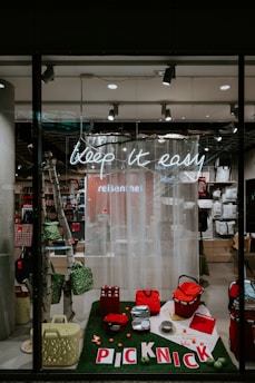 red bags and basket on display