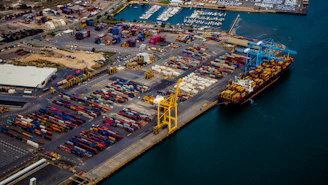 docked shipping ship on body of water