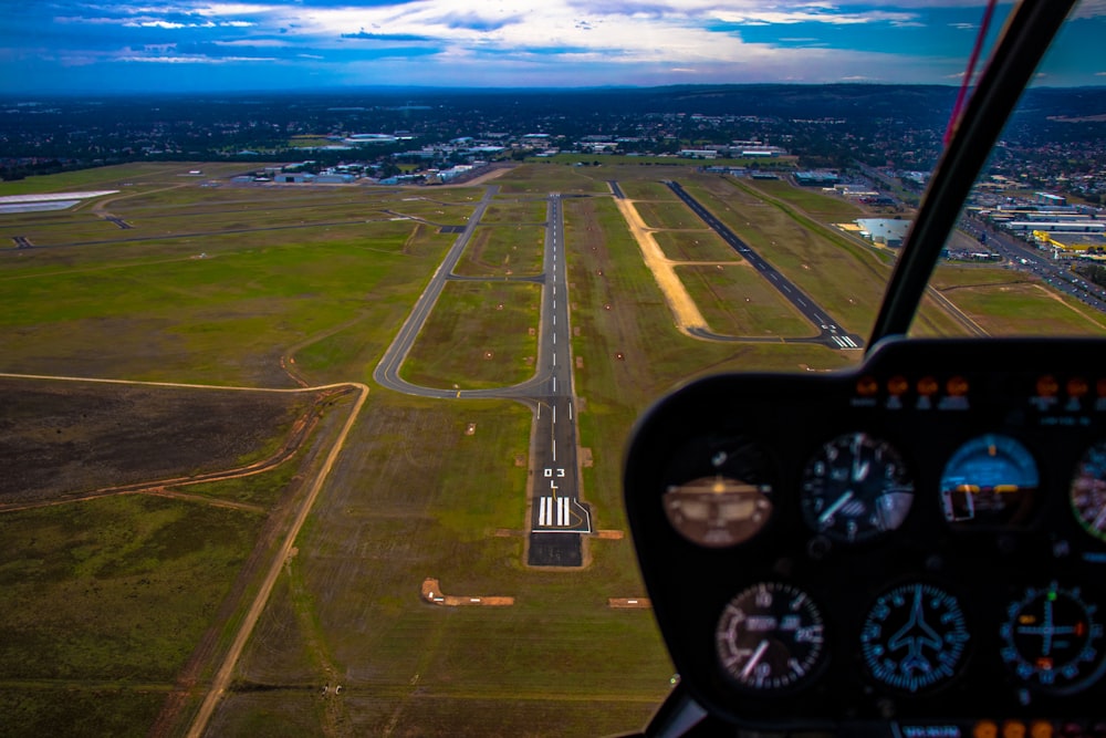 vehicle mirror viewing aerial view of land