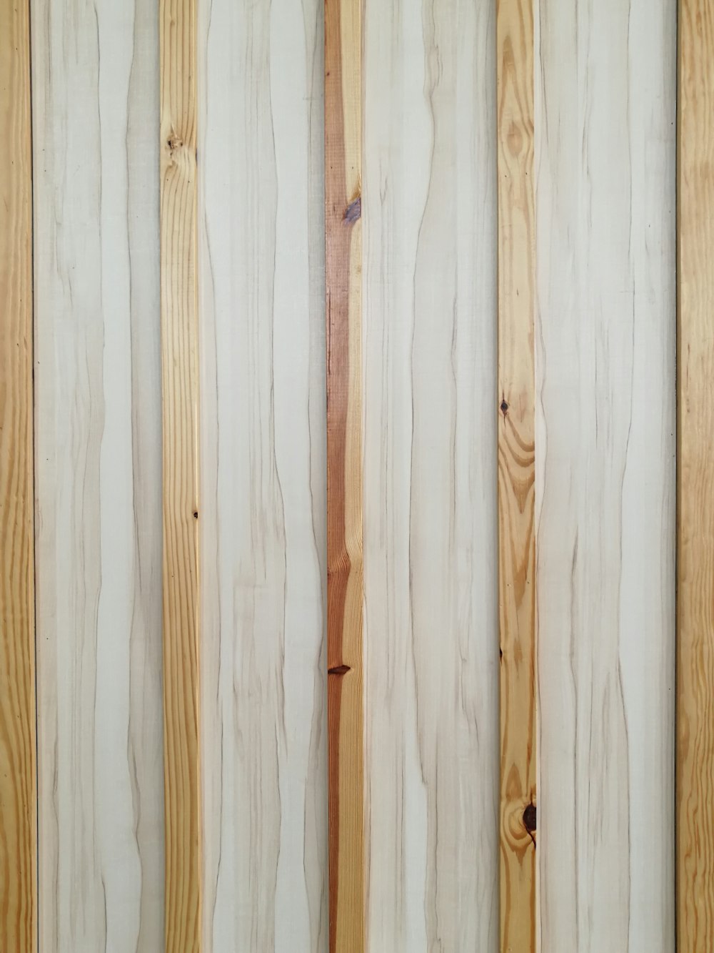 un gros plan d’un mur en bois