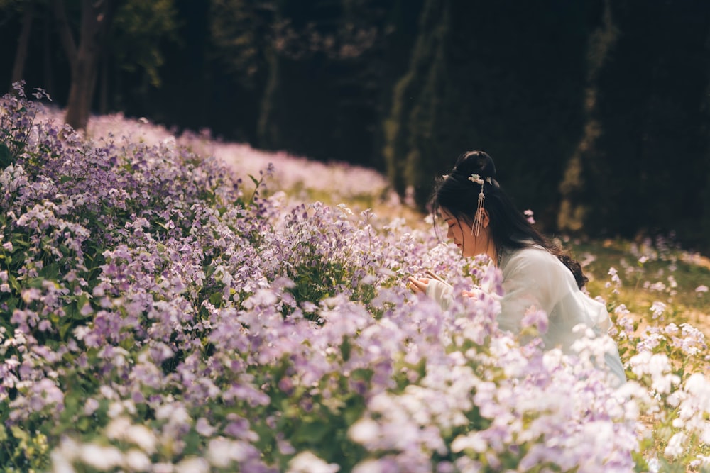 woman near flower field