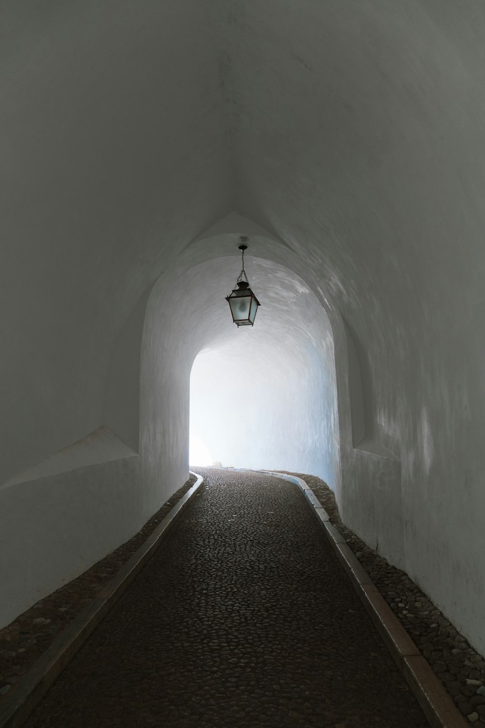 white concrete tunnel