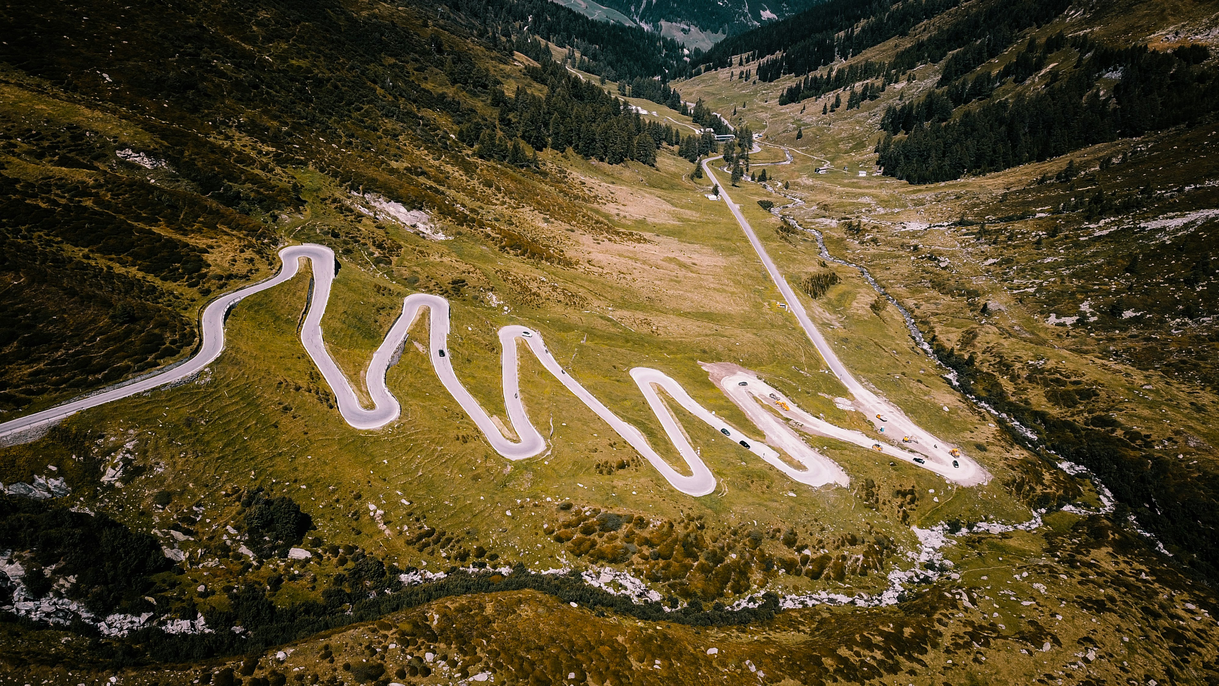 aerial photography of zig zag road