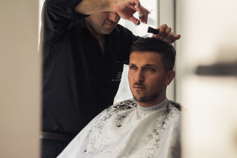 man getting a haircut