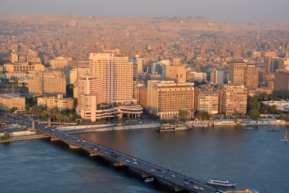 aerial photography of city beside body of water