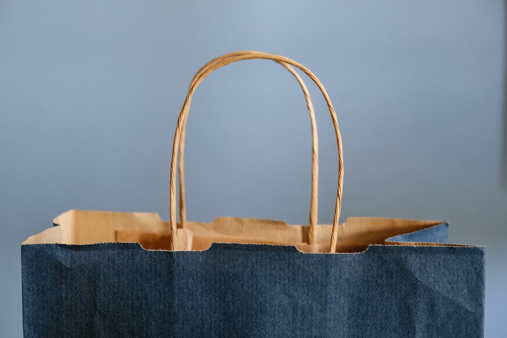 blue and brown tote bag